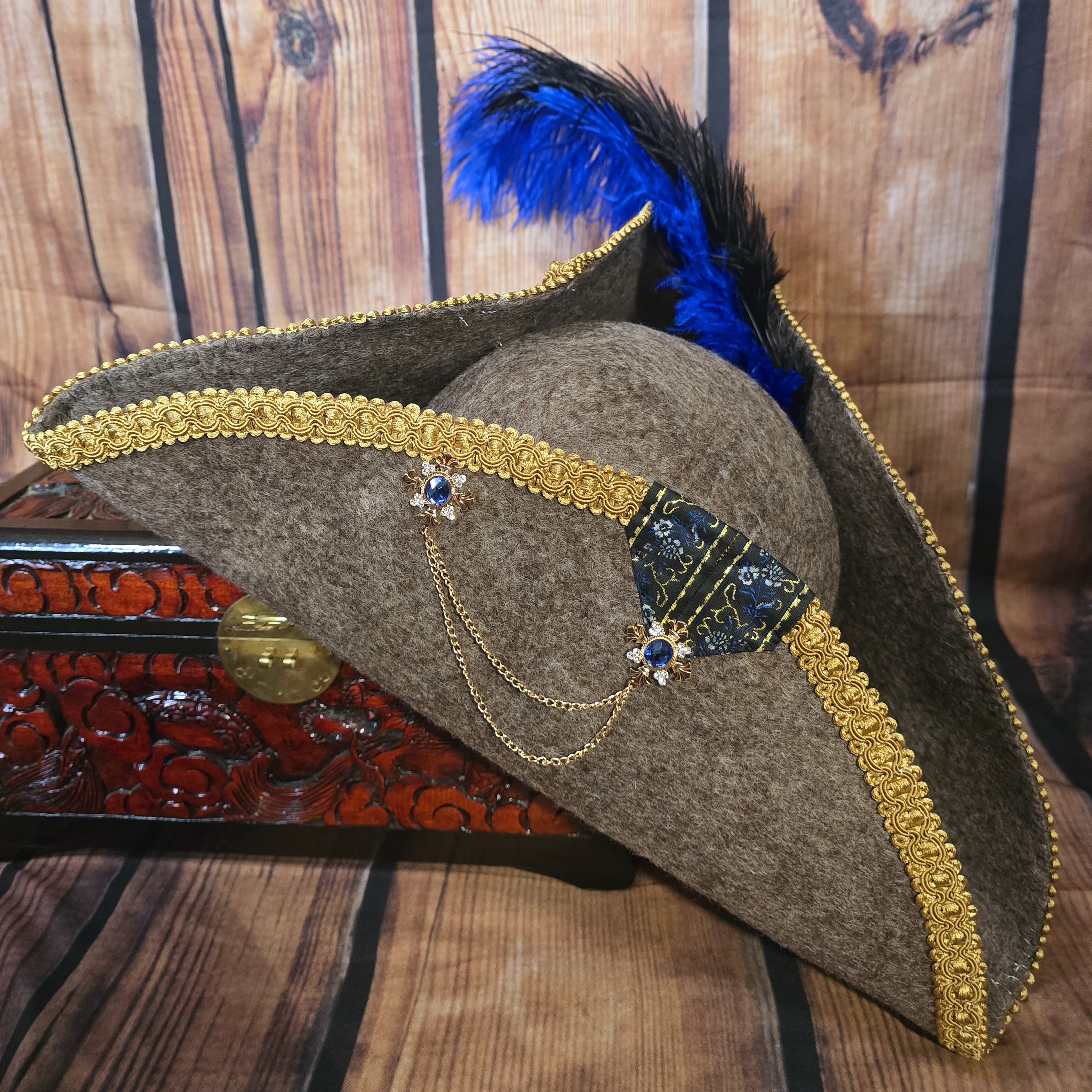 Gold Faun With Blue Brooch